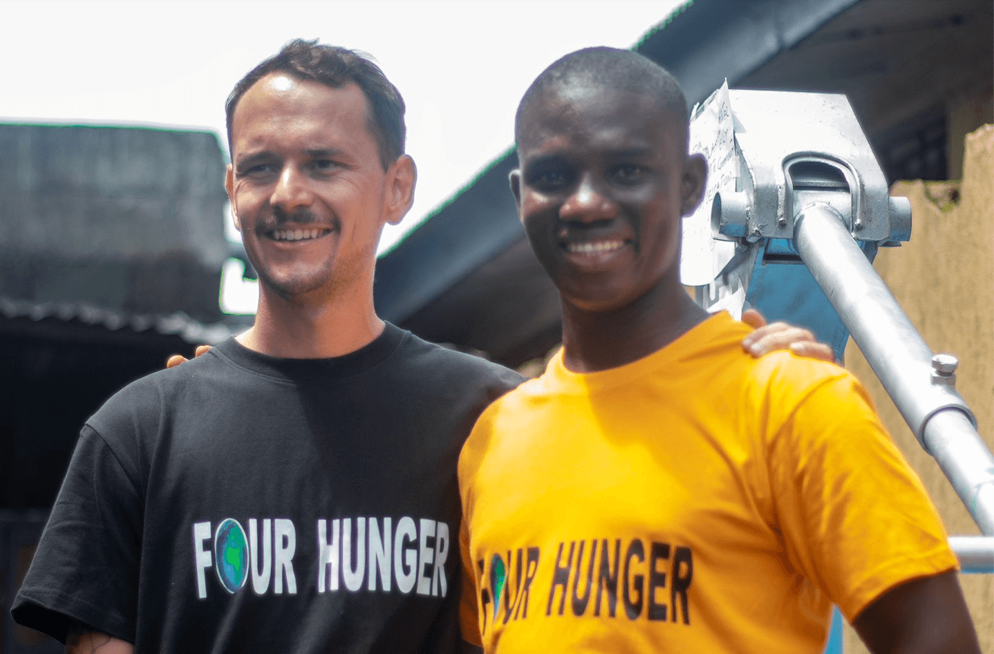 Zach Branch and Windell King standing together in Four Hunger shirts.